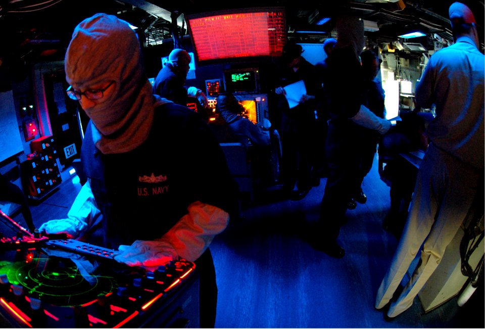 US Navy 070213-N-1328S-005 Sailor aboard the amphibious assault ship USS Boxer (LHD 4) monitors the surface search radar in the ship's combat Information Center during a general quarters drill