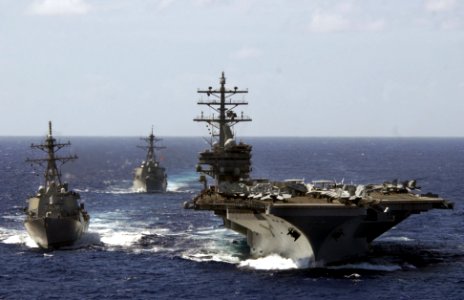 US Navy 070209-N-5961C-001 Surging ahead in the South Pacific, the Nimitz-class aircraft carrier USS Ronald Reagan (CVN 76), along with the guided missile destroyers USS Paul Hamilton (DDG 60) and USS Russell (DDG 59) performed