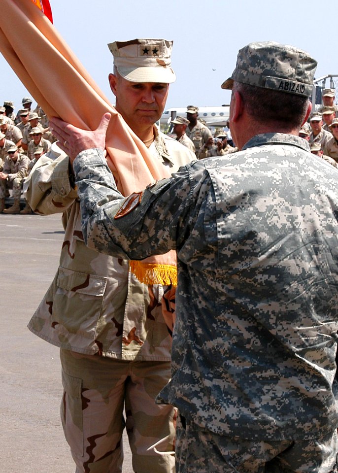 US Navy 070214-F-8043B-217 U.S. Rear Adm. Richard Hunt relinquishes the Combined Joint Task Force-Horn of Africa (CJTF-HOA) command flag to Commander, U.S. Central Command, U.S. Army Gen. John Abizaid, during CJTF-HOA change of