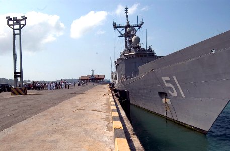 US Navy 070209-N-8534H-003 U.S. Ambassador to Cambodia Joseph A. Mussomeli and Commanding Officer of the guided missile frigate USS Gary (FFG 51) Cmdr. Joseph Deleon conduct a press conference with local and international news
