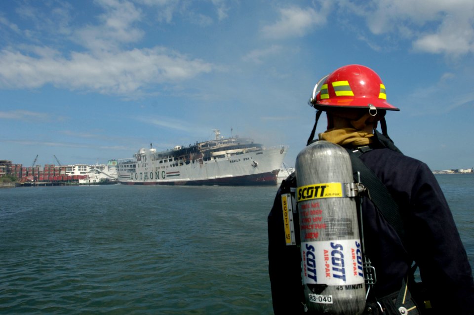 US Navy 070212-N-4790M-161 Members of the rescue and assistance team aboard amphibious command ship USS Blue Ridge (LCC 19) respond to a shipboard fire on board the passenger ferry Manila Bay I