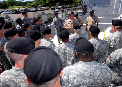 US Navy 070214-N-4965F-004 USS Lake Erie (CG 70) Commanding Officer, Capt. Randall Hendrickson, speaks with U.S. Army chaplains and assistants from U.S. Army, Pacific (USARPAC) on the flight deck of Lake Erie during a ship visi