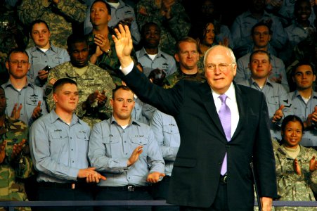 US Navy 070221-N-7883G-068 Vice President Dick Cheney waves to the audience after speaking to military personnel, family members and Department of Defense civilian employees during a visit to USS Kitty Hawk (CV 63) photo