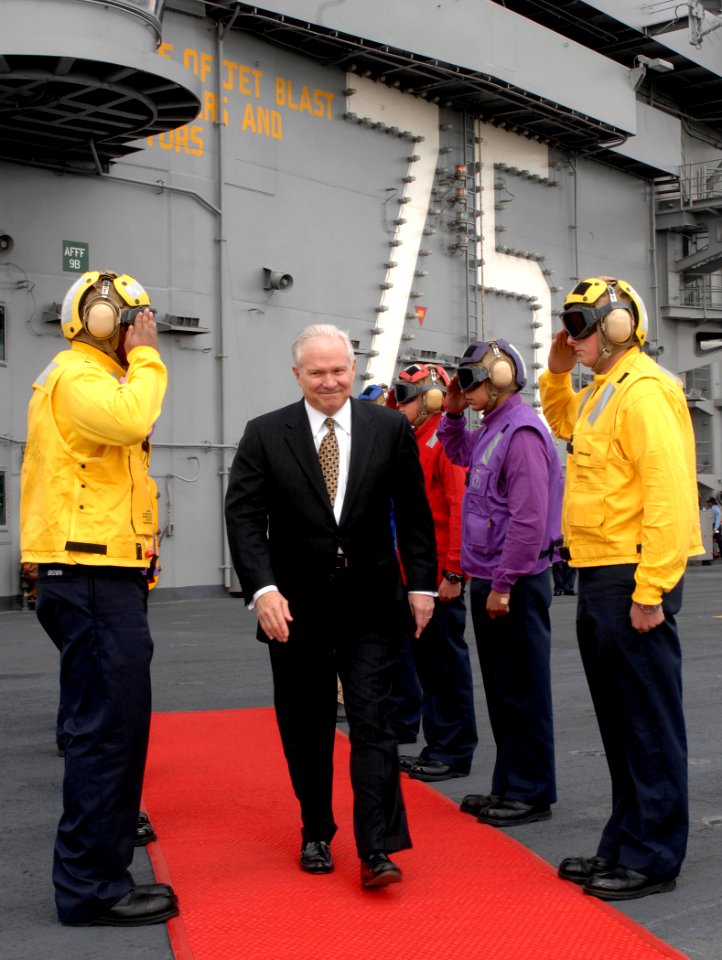 US Navy 070222-N-5345W-107 Secretary of Defense (SECDEF) the Honorable Dr. Robert M. Gates departs USS Harry S. Truman (CVN 75) through rainbow side boys after touring the Nimitz-class aircraft carrier