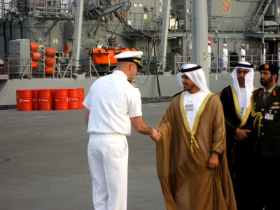 US Navy 070219-N-0000O-001 Cmdr. Scott Davies, commander, Mine Countermeasures Division (MCMDIV) 31, greets Sheikh Sultan bin Tahnoon Al Nahyan, chairman of Abu Dhabi Tourism Authority
