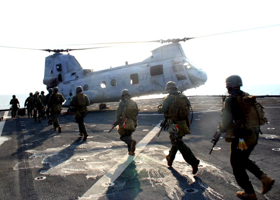 US Navy 070221-N-6710M-005 Members from the 31st Marine Expeditionary Unit prepare to board CH-46 helicopter while conducting a profile exercise with members from USS Tortruga (LSD 46) Visit, Board, Search and Seizure (VBSS) te photo