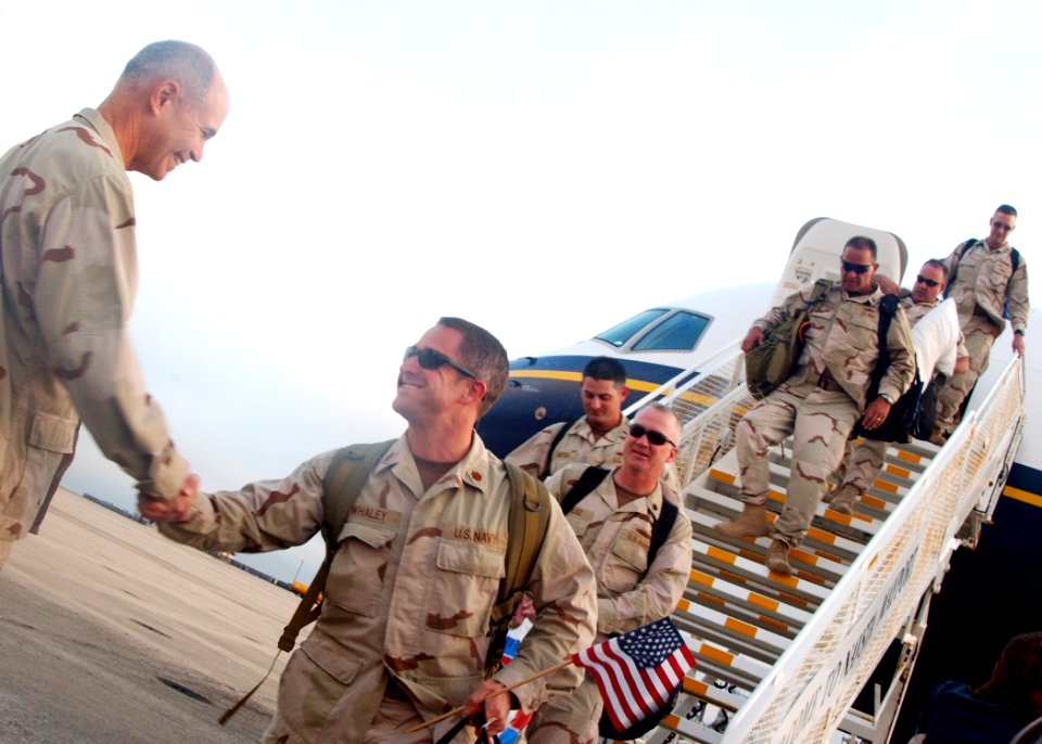 US Navy 070222-N-3285B-039 Commander, Combined Joint Task Force - Horn of Africa (CJTF-HOA) Rear Adm. Richard W. Hunt, greets fellow members of CJTF-HOA upon their return to Naval Station Mayport