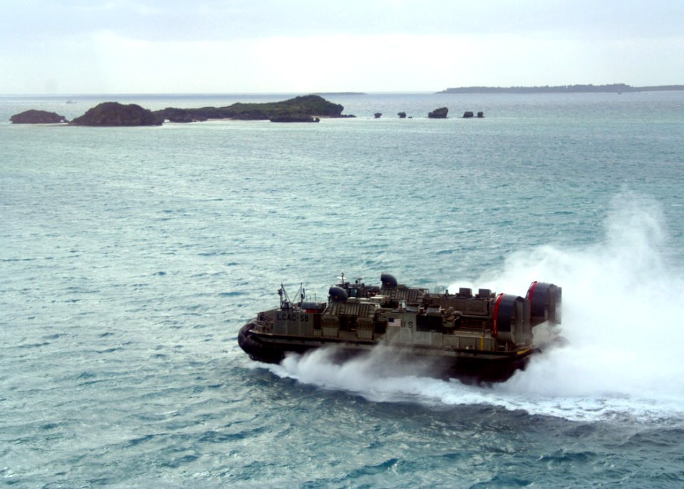 US Navy 070301-N-6710M-001 A landing craft air cushion (LCAC) prepares to enter the well deck of dock landing ship USS Tortuga (LSD 46) after conducting LCAC maintenance turns