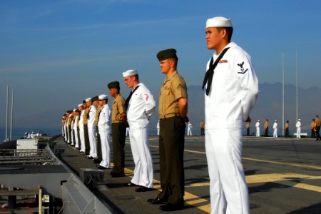 US Navy 070223-N-4124C-016 Sailors and embarked Marines of the 31st Marine Expeditionary Unit (MEU) aboard amphibious transport dock USS Juneau (LPD 10) man the rails as the ship arrives for a scheduled port visit
