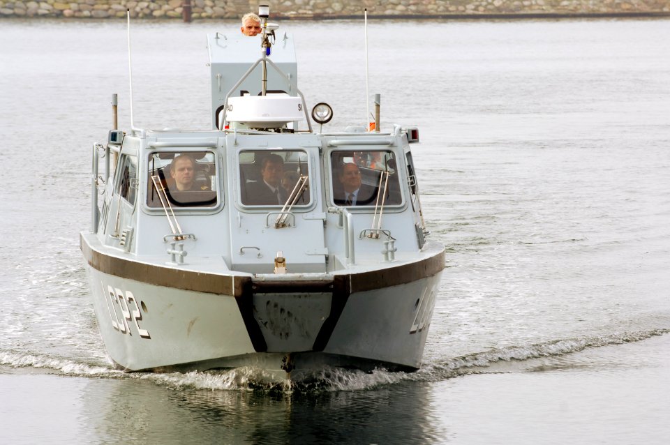 US Navy 070220-N-3642E-001 Secretary of the Navy (SECNAV), the Honorable Donald C. Winter takes a tour of the Korsur Naval Base, aboard a Landing Craft Patrol (LCP) boat