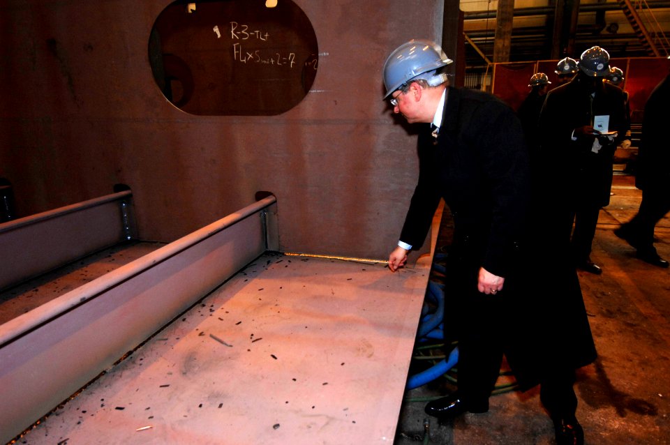US Navy 070220-N-3642E-016 Secretary of the Navy (SECNAV), the Honorable Donald C. Winter tours an automated robotic welding facility at the A.P. Moller-Maersk's Odense Steel Shipyard
