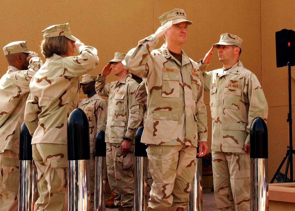 US Navy 070227-N-4205W-001 Vice Adm. Patrick Walsh salutes after passing through sideboys during a change of command ceremony at Naval Support Activity, Bahrain