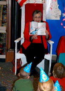 US Navy 070303-N-1082Z-002 Mayor Meyera E. Oberndorf of Naval Air Station Oceana, Virginia Beach, reads Cat in the Hat to children at the Oceana Navy Exchange (NEX) during the store's celebration of title character's