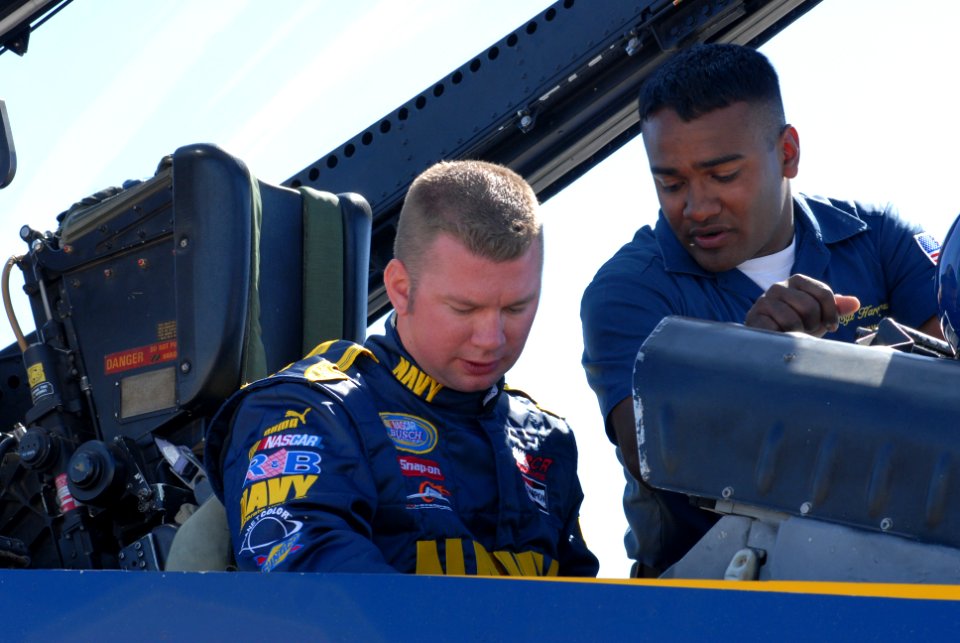 US Navy 070226-N-9195K-024 Shane Huffman, driver of the Navy's ^88 Monte Carlo in the NASCAR Busch Series, receives preflight instructions before taking a ride in one of the Blue Angels F-A-18 Hornets
