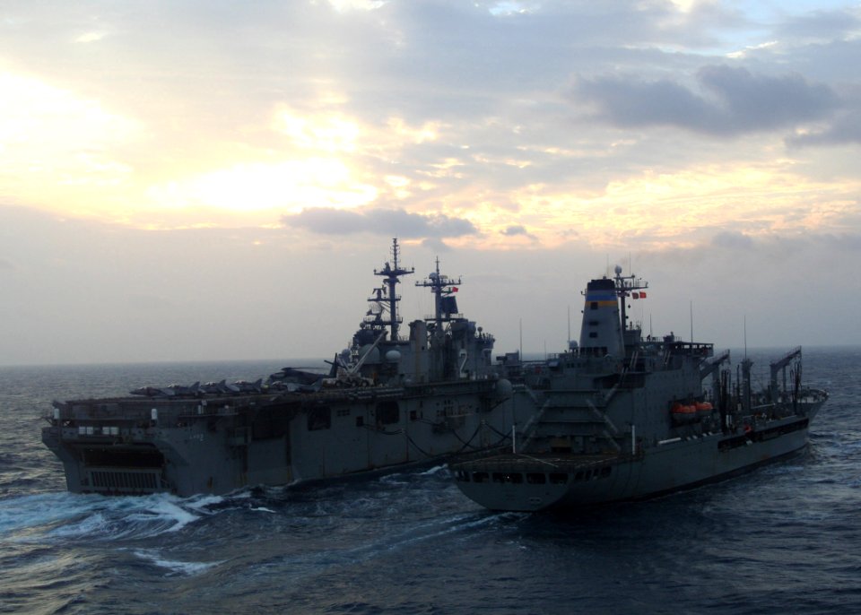 US Navy 070223-N-6710M-001 Amphibious assault ship USS Essex (LHD 2) comes alongside Military Sealift Command (MSC) fleet replenishment oiler USNS Pecos (T-AO 197) for refueling during an underway replenishment (UNREP) in the v