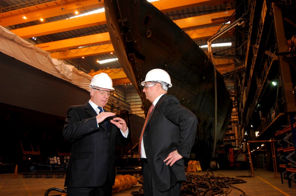 US Navy 070221-N-3642E-006 Secretary of the Navy (SECNAV), the Honorable Donald C. Winter receives a tour of the Vosper Thornycroft (VT) Shipbuilding facility