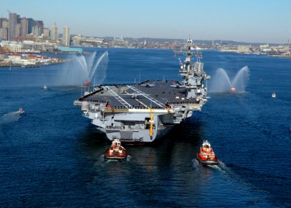 US Navy 070301-N-4565G-010 More than 1,000 Sailors man the rails of USS John F. Kennedy (CV 67) as she makes her transit to her final port call in Boston after 38 years of service