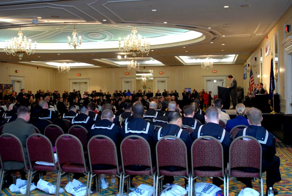 US Navy 070301-N-0193M-104 Navy, Army, Marine Corps, Air Force and Coast Guard personnel receive certificates of appreciation for their outstanding work in support of their commands and communities