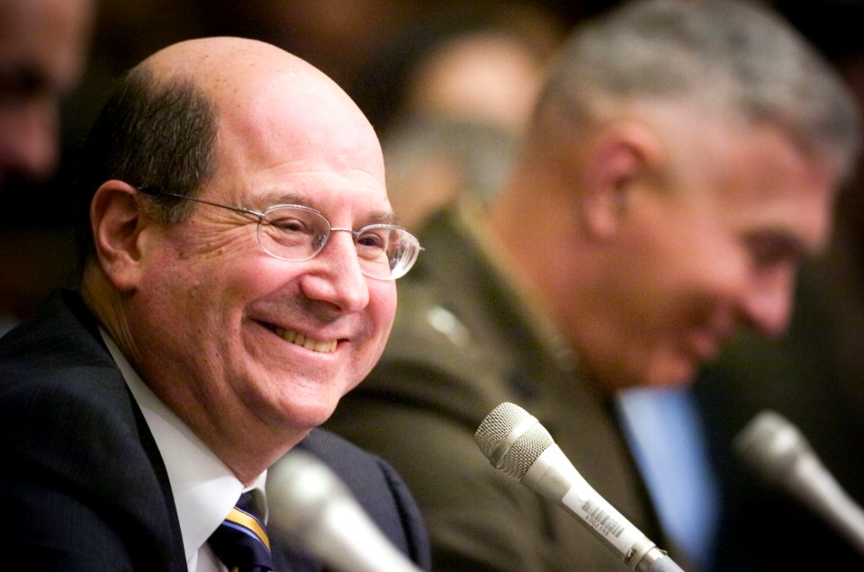 US Navy 070301-N-0696M-179 Secretary of the Navy (SECNAV) the Honorable Dr. Donald C. Winter smiles at a statement made during the House Armed Services Committee hearing on the 2008 National Defense Budget Request at the Raybur