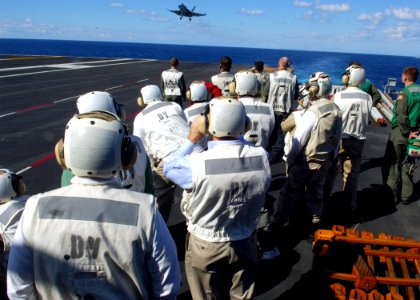 US Navy 070307-N-6524M-004 A group of distinguished visitors observe flight operations aboard nuclear-powered aircraft carrier USS Enterprise (CVN 65)