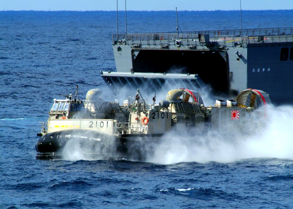 US Navy 070307-N-0120A-057 A Japan Maritime Self Defense Force (JMSDF) landing craft air cushion (LCAC) passes by Japanese Defense Ship (JDS) Ohsumi (LST 4001) during LCAC operations as part of Transport Exercise (TRANSPORTEX)
