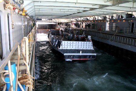 US Navy 070307-N-6710M-001 A Landing Craft Utility (LCU) enters the well deck of amphibious transport dock USS Tortuga (LSD 46) while conducting amphibious operations photo