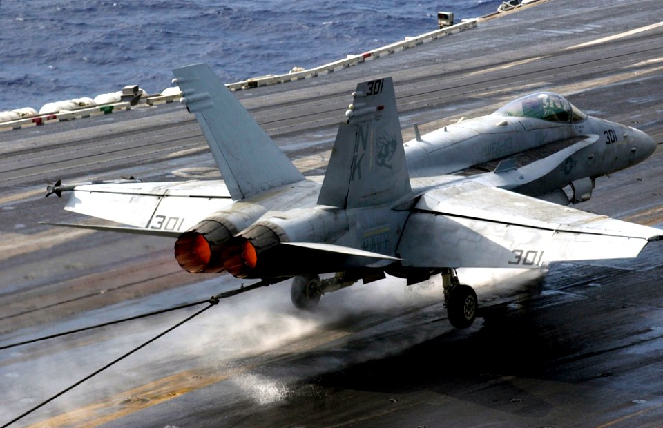 US Navy 070305-N-7130B-145 An F-A-18C Hornet, assigned to the Stingers of Strike Fighter Squadron (VFA) 113, makes an arrested landing