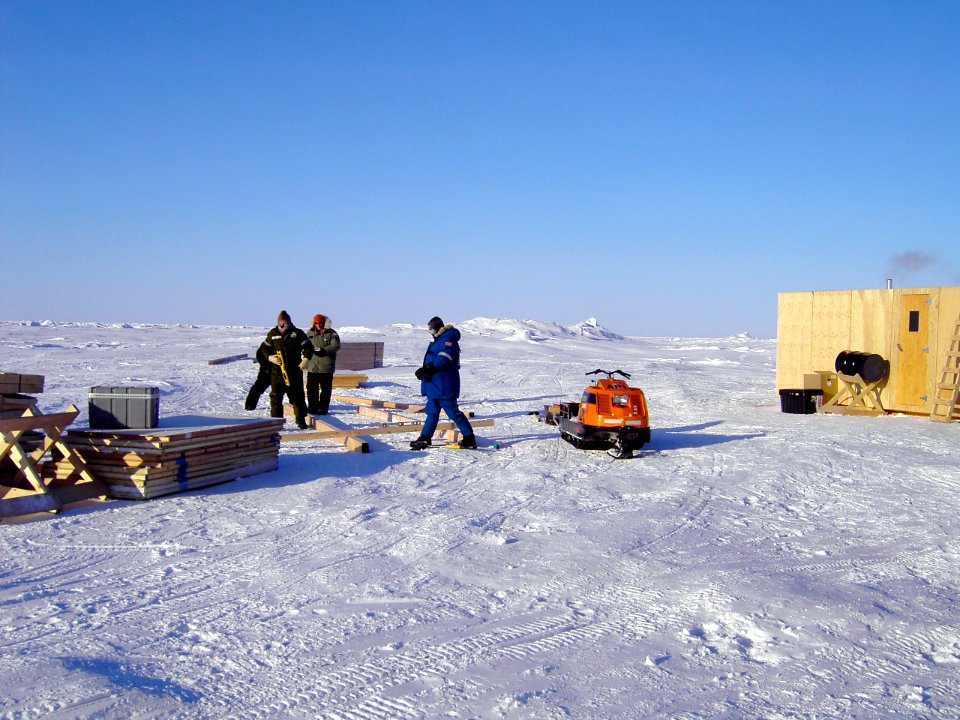 US Navy 070303-N-7179R-001 Steve Haze, Travis Major and Electrician's Mate 3rd Class Robert Baker begin construction on the Applied Physics Ice Station (APLIS)