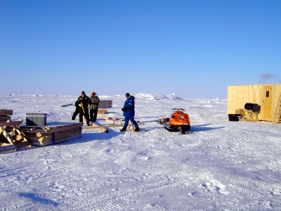 US Navy 070303-N-7179R-001 Steve Haze, Travis Major and Electrician's Mate 3rd Class Robert Baker begin construction on the Applied Physics Ice Station (APLIS)