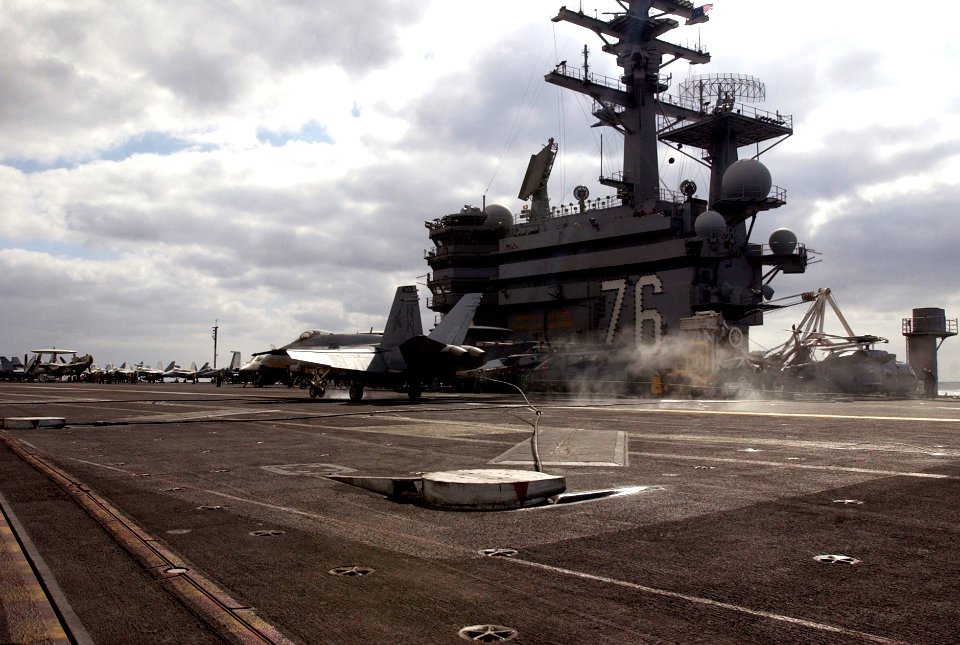 US Navy 070301-N-7130B-162 Commander, Carrier Air Wing (CVW) 14, Capt. Richard Butler makes an arrested landing aboard USS Ronald Reagan (CVN 76) upon his return to the ship following an airborne change of command ceremony