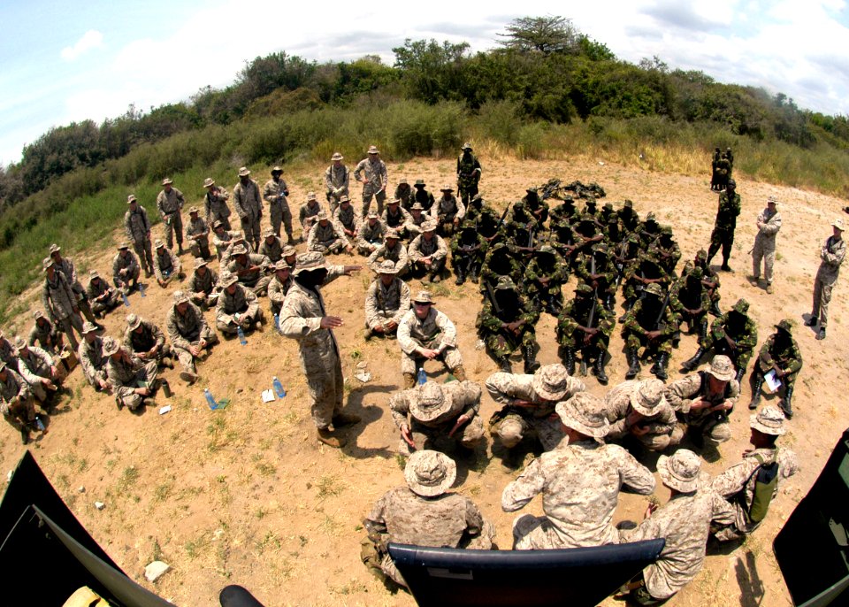 US Navy 070304-N-8154G-211 Marines attached to Battalion Landing Team 2-2, 3rd Platoon, Fox Company, 26th Marine Expeditionary Unit (MEU) demonstrate moving into and out of aircraft tactically