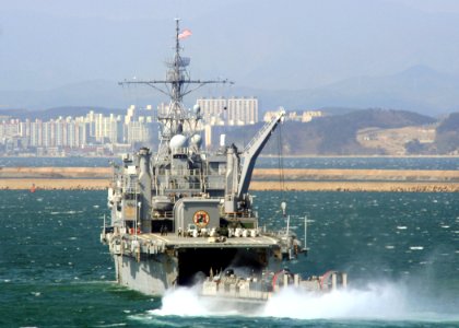 US Navy 070305-N-6710M-006 A landing craft air cushion (LCAC) prepares to enter the well deck of amphibious transport dock USS Juneau (LPD 10) while conducting LCAC operations