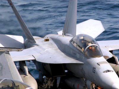 US Navy 070313-N-3038W-238 Pilots assigned to the Black Knights of Strike Fighter Squadron (VFA) 154 test their F-A-18F Super Hornet's ailerons prior to launch