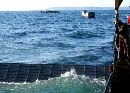 US Navy 070307-N-6710M-004 A Landing Craft Utility (LCU) prepares to enter the well deck of amphibious transport dock ship USS Tortuga (LSD 46) while conducting amphibious operations photo