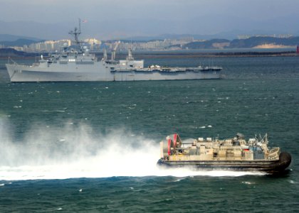 US Navy 070305-N-6710M-013 A landing craft air cushion (LCAC) prepares to enter the well deck of amphibious transport dock USS Juneau (LPD 10) while conducting LCAC operations