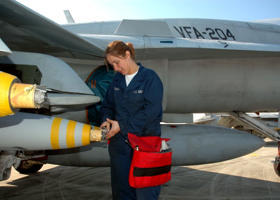 US Navy 070309-N-7427G-003 Aviation Ordanceman Airman Jada Dominey, assigned to Strike Fighter Squadron (VFA) 204, readies fuses for 500-pound bombs during a recent training evolution held aboard Naval Air Station Joint Reserv