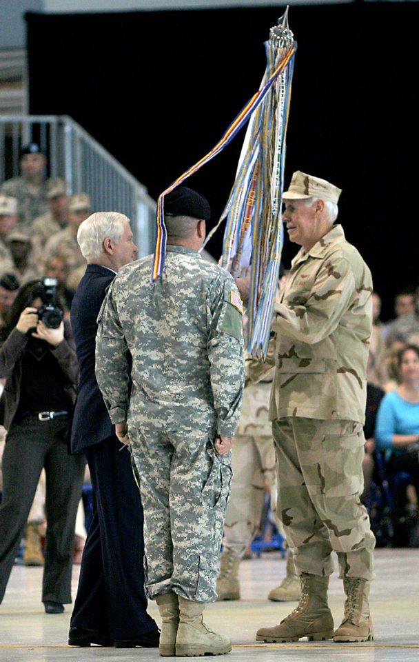 US Navy 070316-A-7445Z-112 Adm. William J. Fallon receives the colors from Secretary of Defense Robert M. Gates