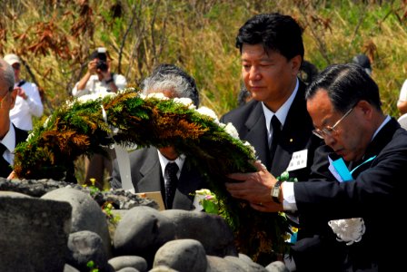 US Navy 070314-N-4124C-069 Japanese dignitaries lay a wreath in front of a Battle of Iwo Jima memorial at the 62nd Commemoration of the Battle of Iwo Jima