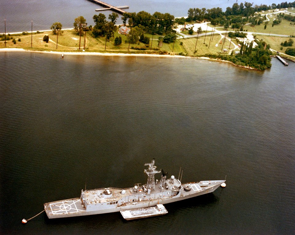 USS Estocin FFG-15 moored near EMPRESS I
