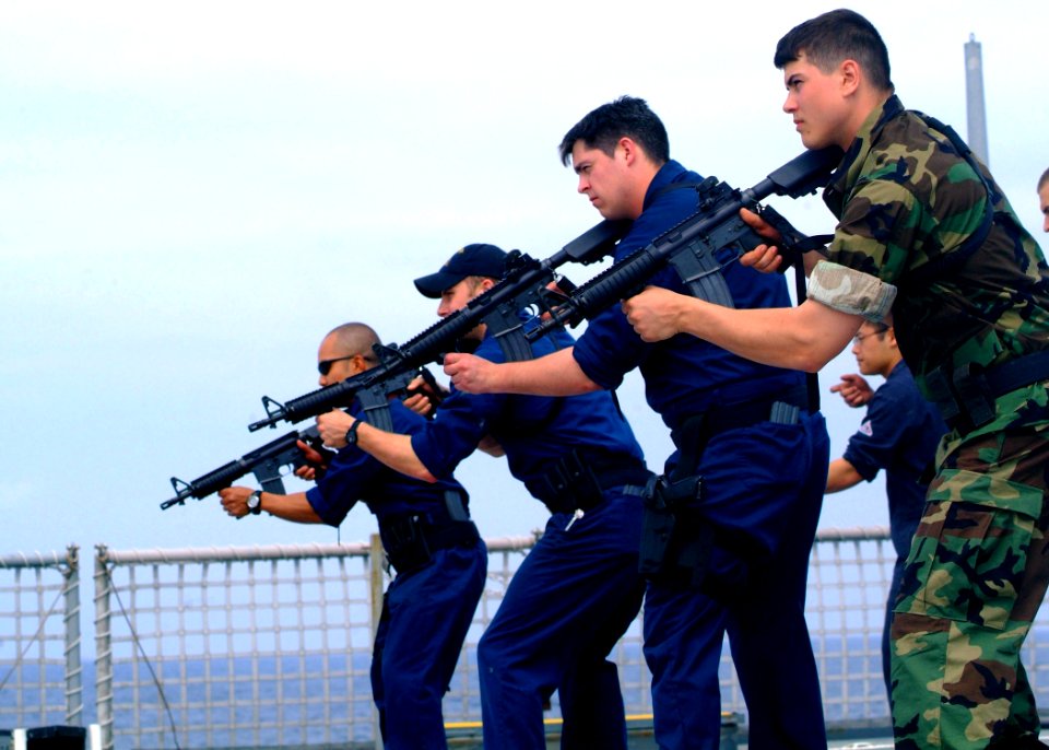US Navy 070311-N-0120A-020 Dock landing ship USS Harpers Ferry (LSD 49) Sailors hold their weapons at the ready during a non-compliant Visit, Board, Search and Seizure (VBSS) training exercise