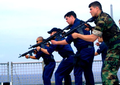 US Navy 070311-N-0120A-020 Dock landing ship USS Harpers Ferry (LSD 49) Sailors hold their weapons at the ready during a non-compliant Visit, Board, Search and Seizure (VBSS) training exercise