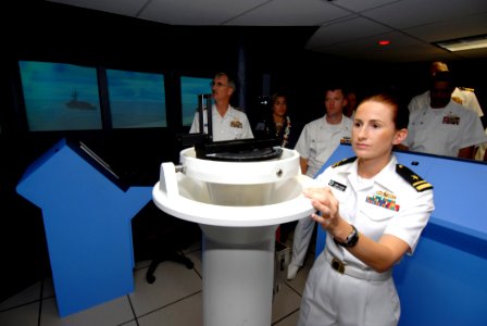 US Navy 070314-N-4965F-007 Lt.j.g. Jenna Rauning, assigned to Afloat Training Group Middle Pacific (ATG MIDPAC), acts as the conning officer of a bridge watch team while simulating an approach for underway replenishment