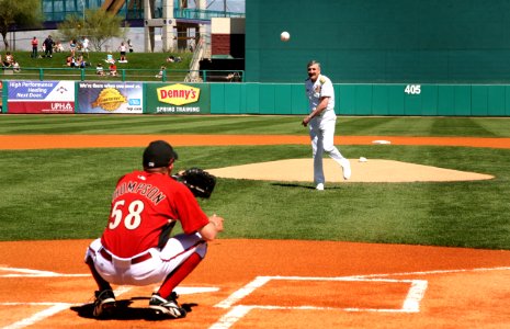 US Navy 070315-N-3271W-002 Commander, U.S. Second Fleet, Vice Adm. Evan M. Chanik throws the first pitch at a pre-season baseball game between the Arizona Diamondbacks and Texas Rangers