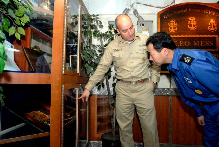 US Navy 070316-N-7730P-023 Command Master Chief (CMDCM) Jim Delozier gives JS Myoko's (DDG 175) CMDCM Osamu Natsume, Japan Maritime Self Defense Force (JMSDF), a tour