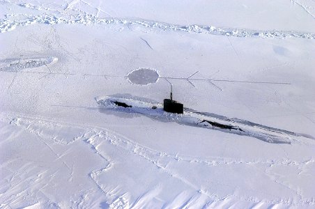 US Navy 070318-N-3642E-473 Los Angeles-class fast attack submarine USS Alexandria (SSN 757) is submerged after surfacing through two feet of ice during ICEX-07, a U.S. Navy and Royal Navy exercise photo