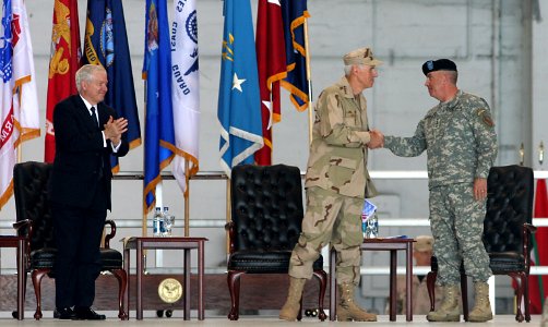 US Navy 070316-A-7445Z-235 Adm. William J. Fallon, Commander United States Central Command shakes the hand of his predecessor, Gen. John P. Abizaid