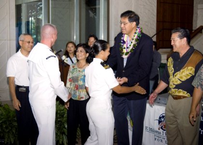US Navy 070319-N-4856G-007 The governor and members of the city and county of Honolulu Department of Environmental Services congratulate Master-at-Arms 1st Class Fred D. Roach and Lt. Maria Navarro