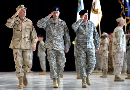 US Navy 070316-A-7445Z-076 Gen. John P. Abizaid, right, inspects the troops for a final time during the Change of Command ceremony at MacDill Air Force Base, Tampa, Fla
