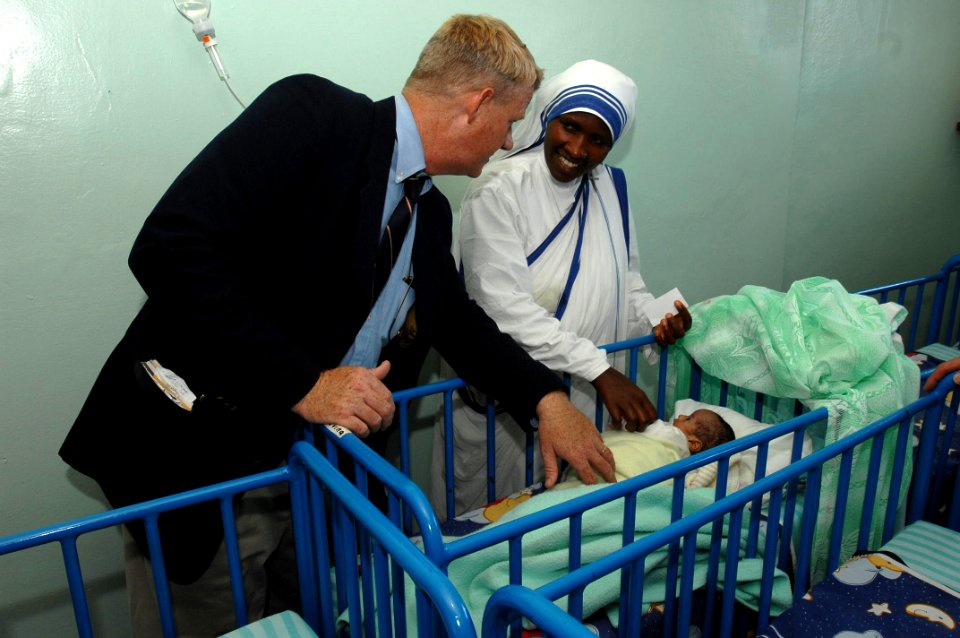 US Navy 070321-F-0524H-151 Chaplain (Cmdr.) W.M. Sonny Dinkins talks with a nun from the Sisters of Charity Baby Clinic in Antananarivo during a trip to meet with area religious leaders