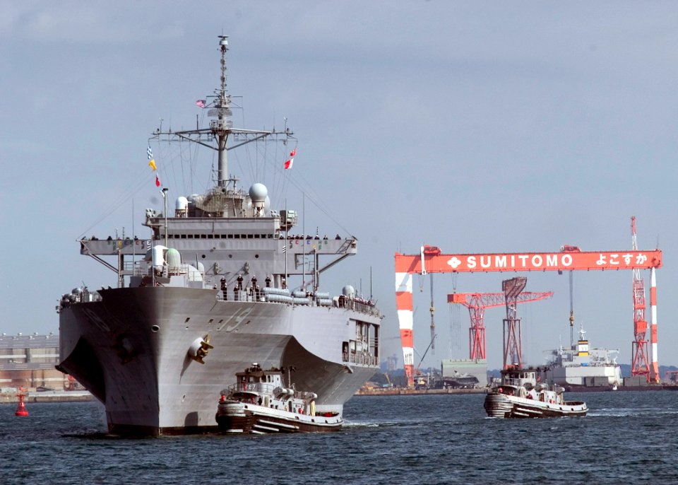 US Navy 070321-N-5253W-001 Tugs come alongside amphibious command ship USS Blue Ridge (LCC 19) as she pulls into forward deployed operating base Fleet Activities Yokosuka